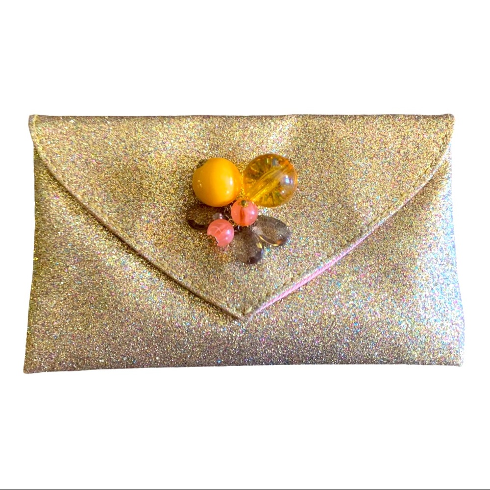 Anthropologie miss Albright hood clutch